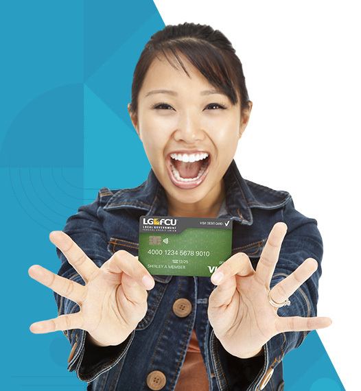 Woman holding debit card