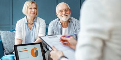 man and woman talking to a financial professional