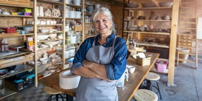 Woman standing in a pottery studio