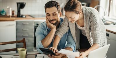 Couple calculating home finances