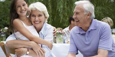 Older couple with grandchild