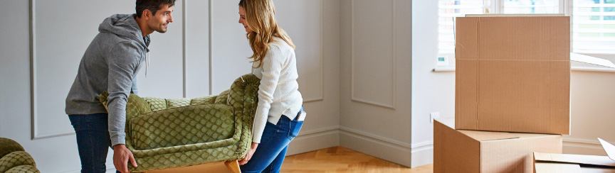 couple moving furniture