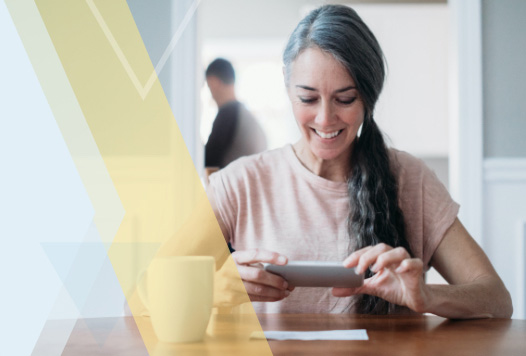 Woman depositing check with phone